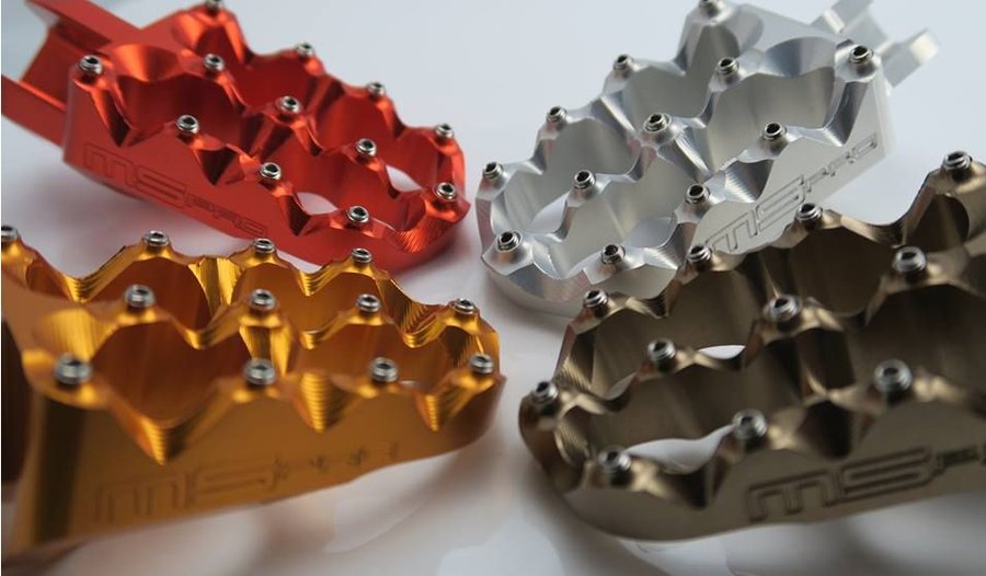 Red, gold and silver anodized brake calipers